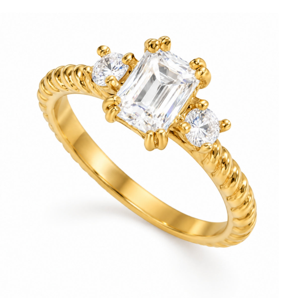 Aurelia Ring - anillo dorado con cristal esmeralda y aro trenzado